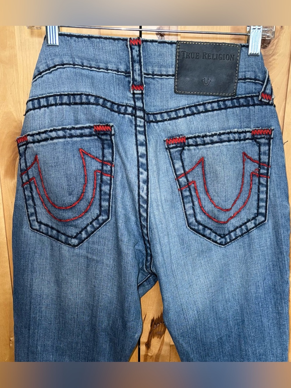 True Religion light blue jeans with red contrast stitching